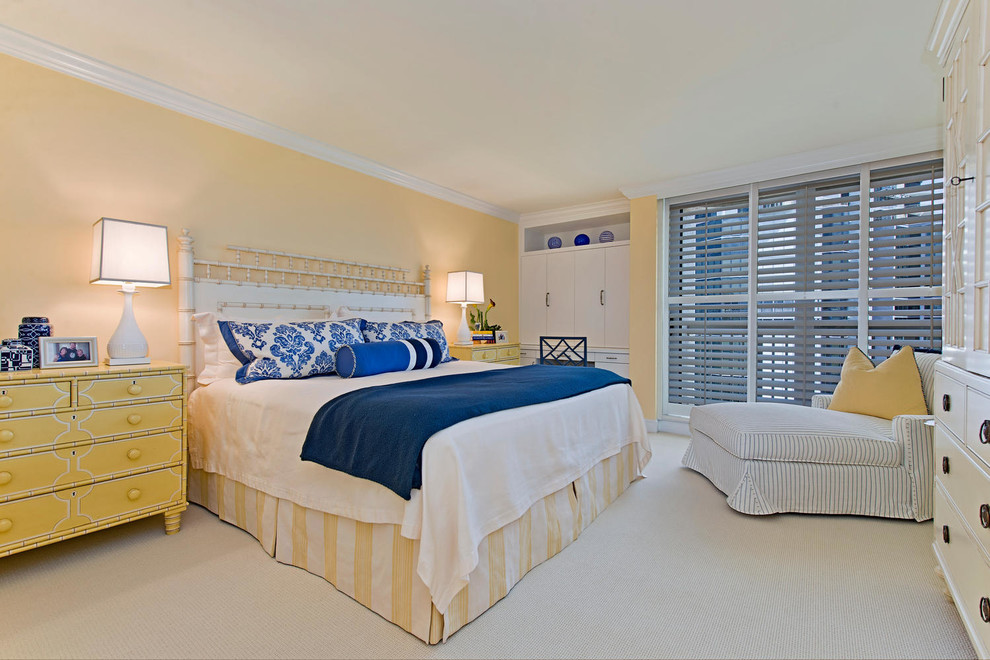 Inspiration for a transitional carpeted bedroom remodel in Miami with yellow walls