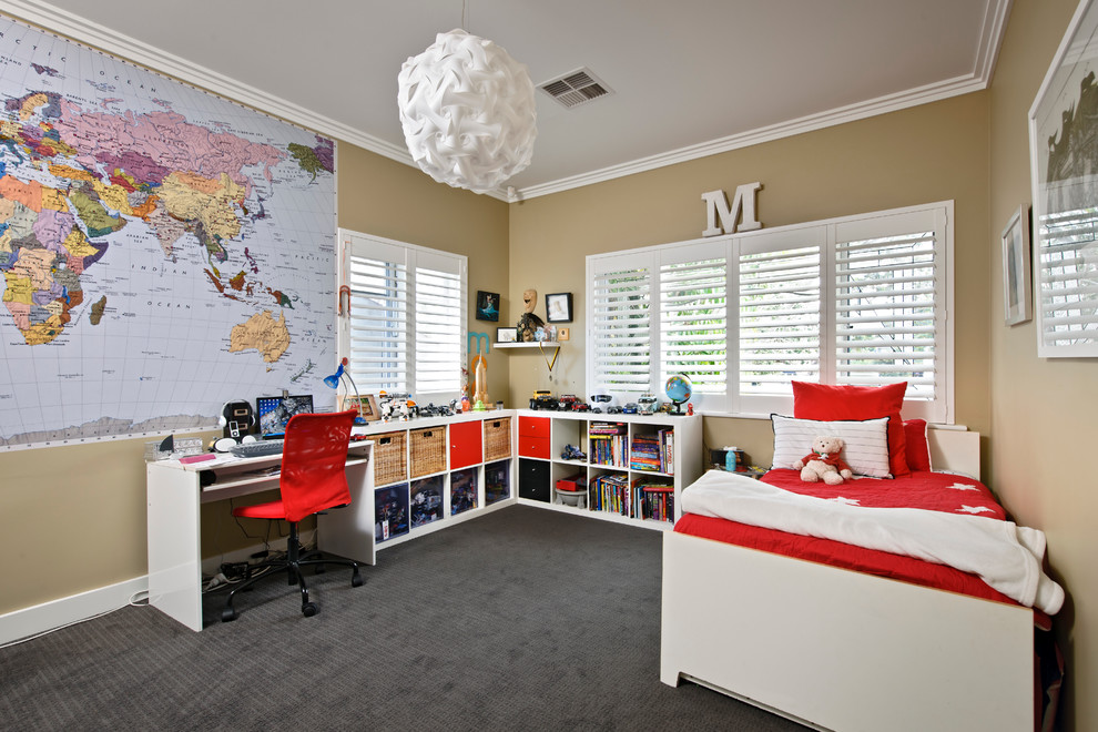Design ideas for a transitional kids' bedroom for kids 4-10 years old and boys in Perth with beige walls and carpet.