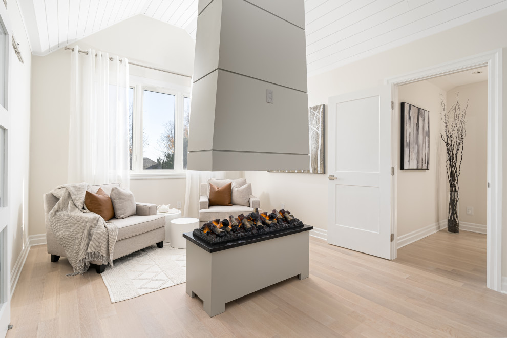 Réalisation d'une grande chambre parentale design avec un mur beige, parquet clair, une cheminée double-face, un manteau de cheminée en lambris de bois et un plafond en lambris de bois.