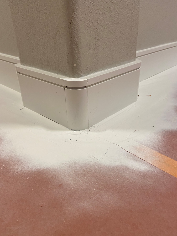 baseboard, nail holes, rounded corner gaps