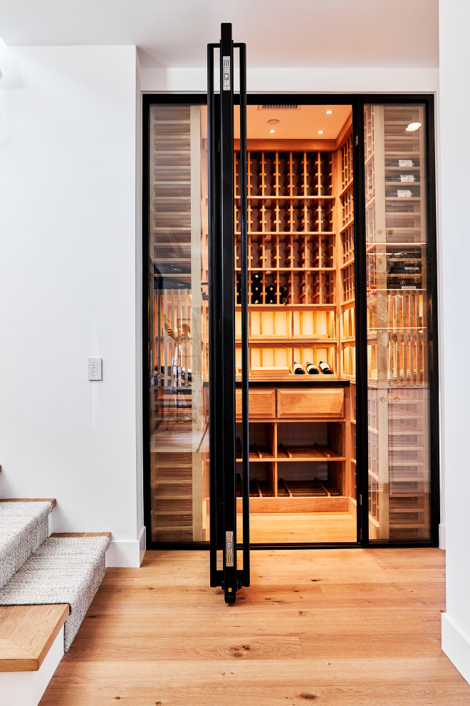 This is an example of a contemporary wine cellar in San Diego.