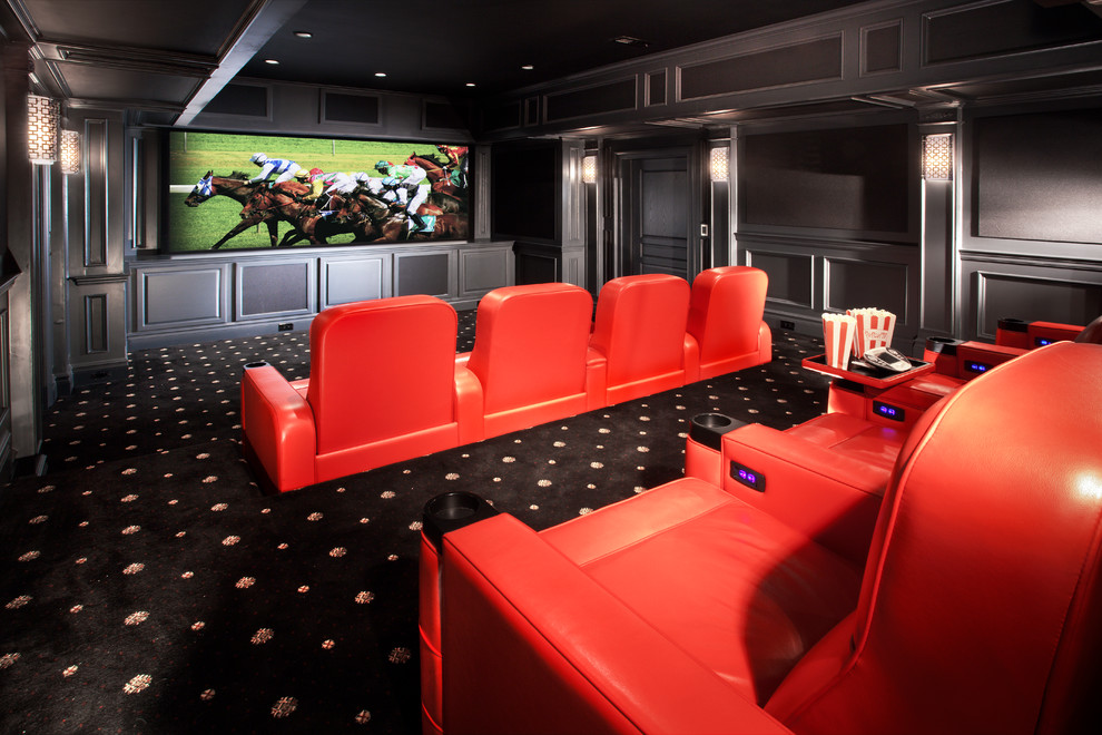 Example of a large classic enclosed carpeted home theater design in New York with gray walls and a wall-mounted tv