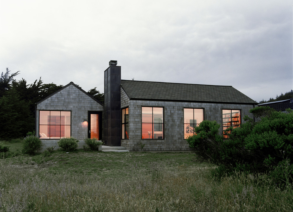 Small transitional one-storey exterior in San Francisco with wood siding and a gable roof.