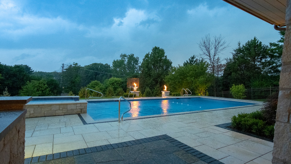 Burr Ridge Lap Pool with Raised Hot Tub and Waterfall Traditional
