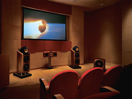 Photo of a modern home theatre in Miami with brown walls, carpet and a built-in media wall.