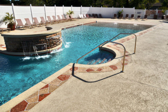 Inspiration for a large contemporary backyard custom-shaped aboveground pool in Nashville with a water feature and concrete pavers.