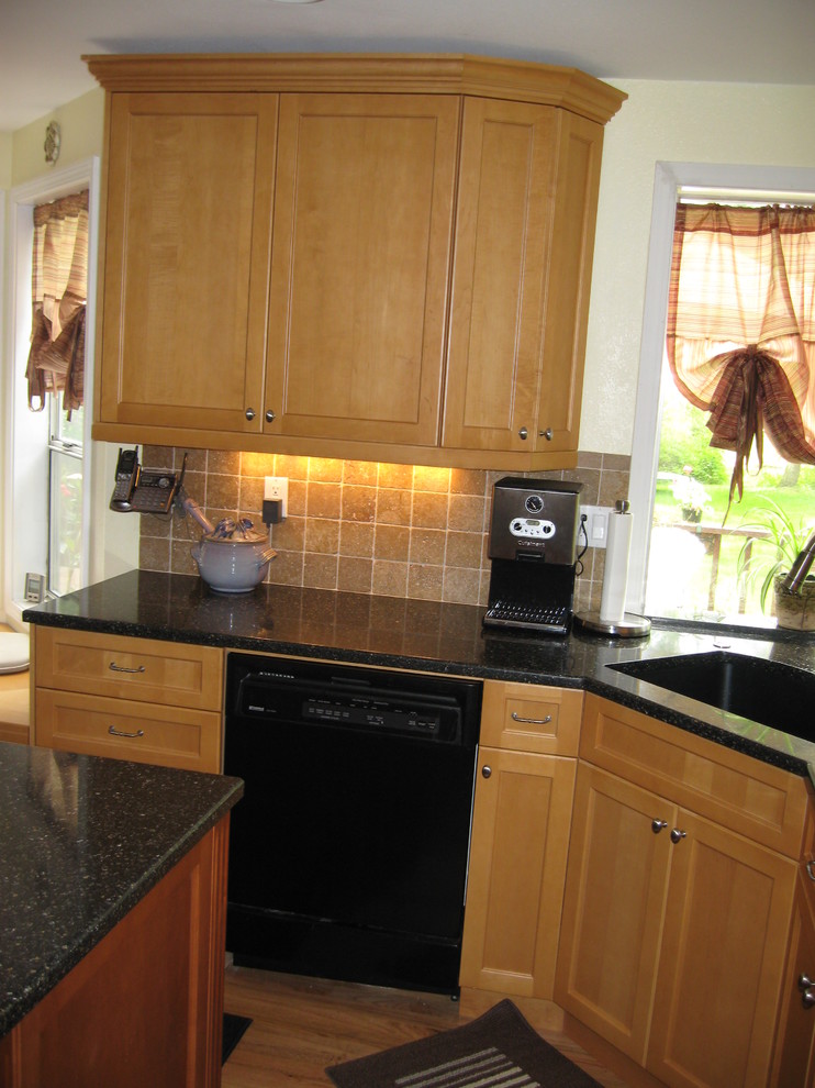 Example of a transitional kitchen design in Seattle