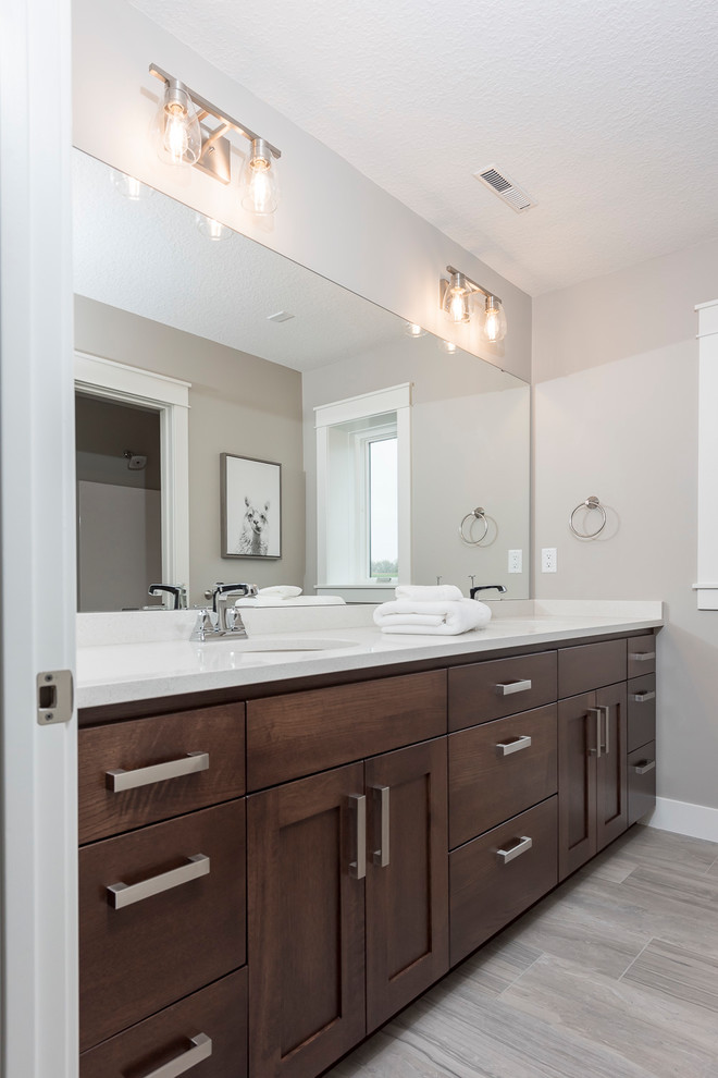 Example of a transitional master bathroom design in Minneapolis