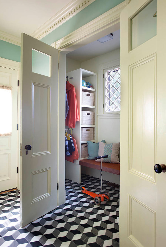 Design ideas for a small arts and crafts mudroom in Boston with a single front door, green walls and marble floors.