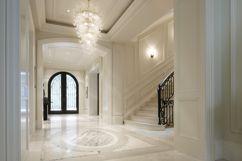 Design ideas for a large traditional front door in Toronto with white walls, marble floors, a double front door and a glass front door.