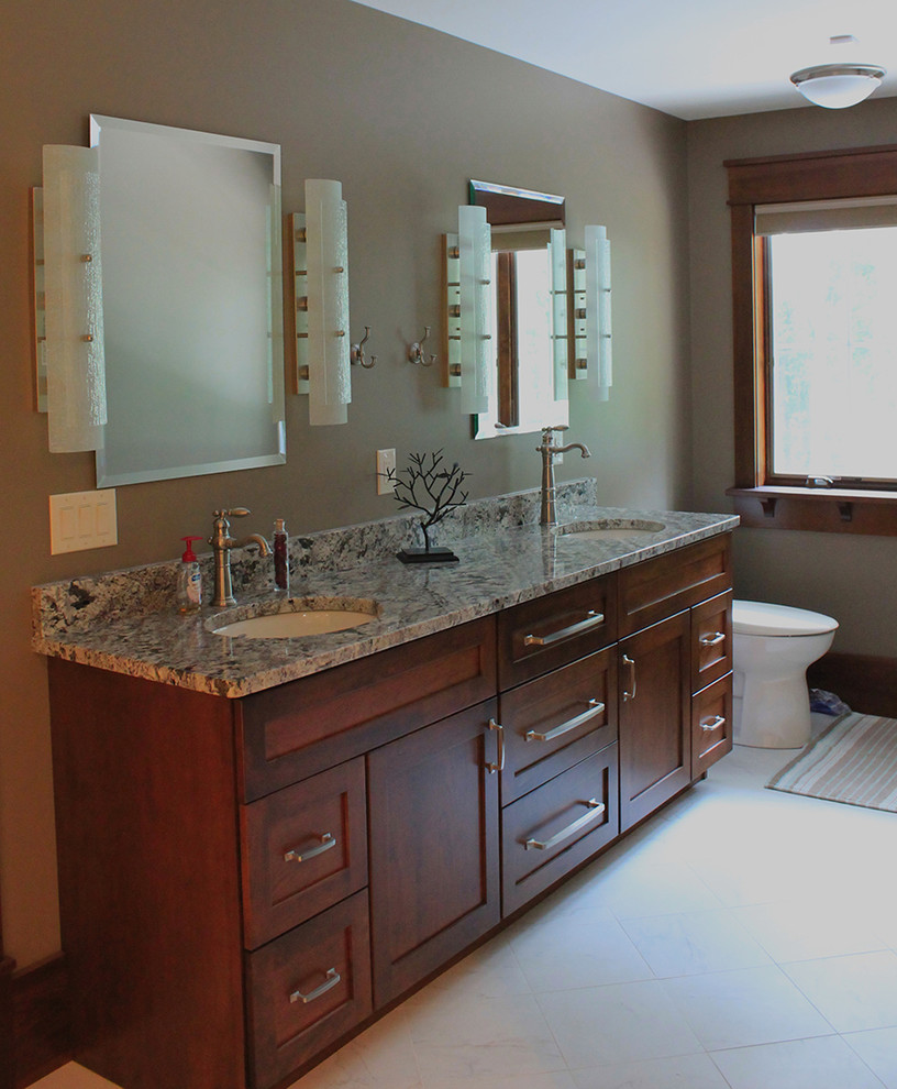 Inspiration for a large arts and crafts master bathroom in Chicago with an undermount sink, shaker cabinets, medium wood cabinets, granite benchtops, an open shower, a one-piece toilet, white tile, ceramic tile, beige walls and ceramic floors.