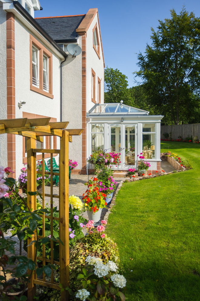 Example of a classic exterior home design in Other
