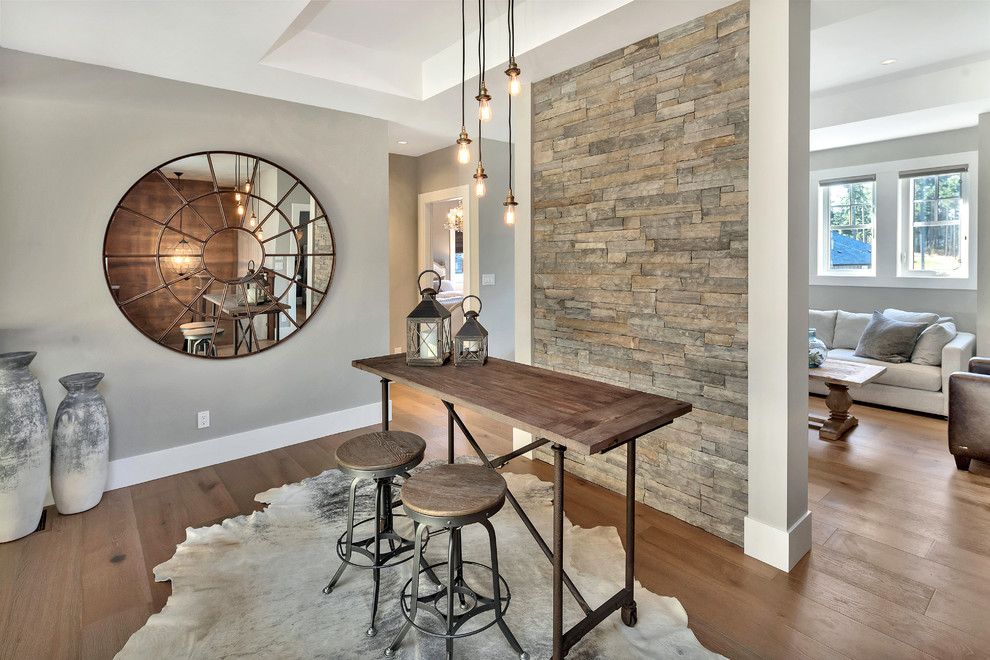 Transitional medium tone wood floor and brown floor hallway photo