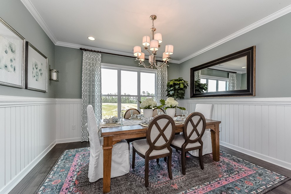 Inspiration for a mid-sized transitional separate dining room in Charlotte with grey walls, dark hardwood floors and no fireplace.