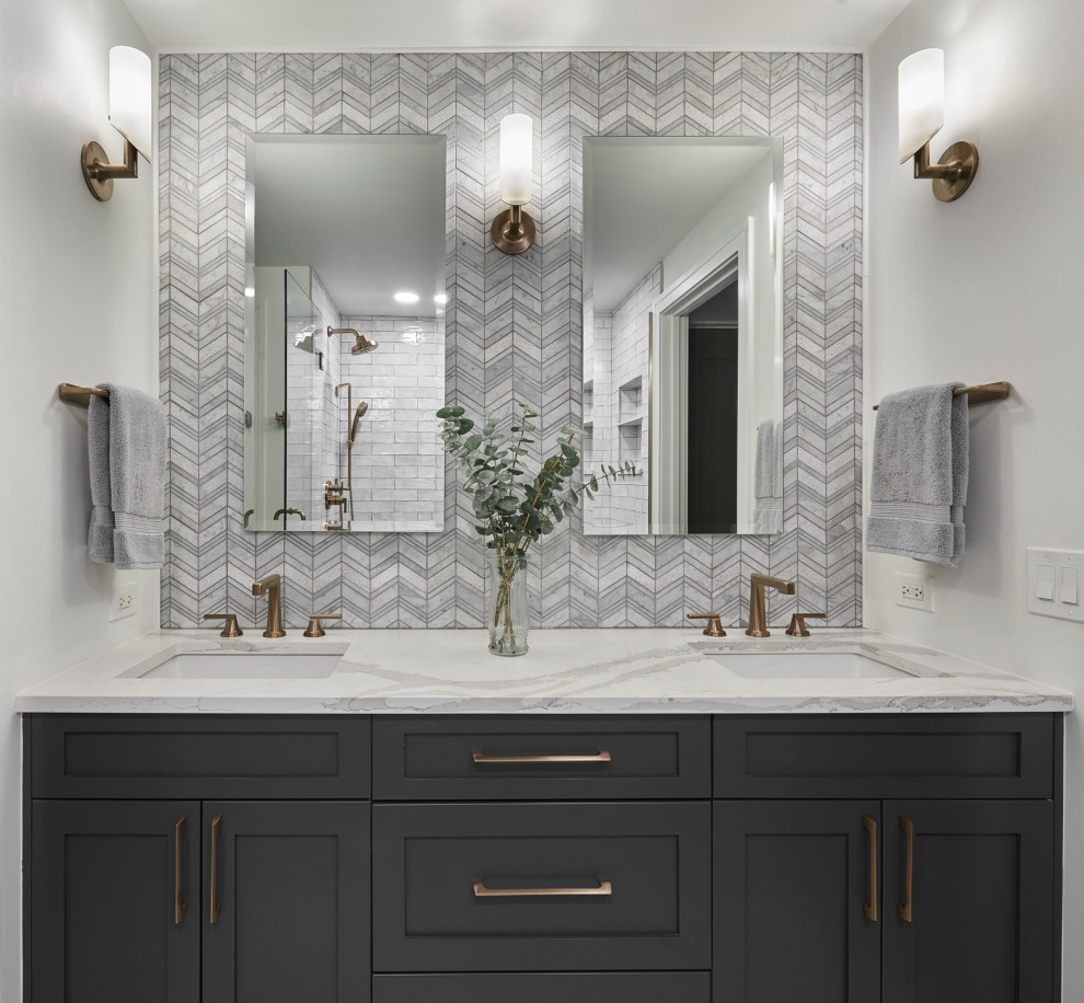 Inspiration for a mid-sized transitional master bathroom in Chicago with recessed-panel cabinets, black cabinets, an alcove shower, gray tile, porcelain tile, white walls, quartzite benchtops, white floor, a hinged shower door, white benchtops, a shower seat, a double vanity and a freestanding vanity.