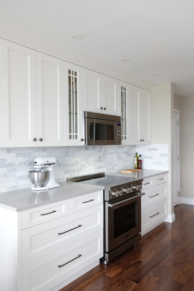 Example of a transitional kitchen design in Vancouver