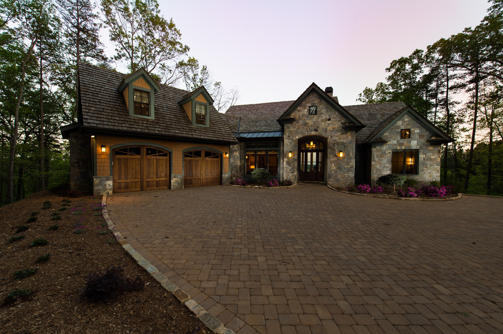 Large modern gray two-story stone exterior home idea