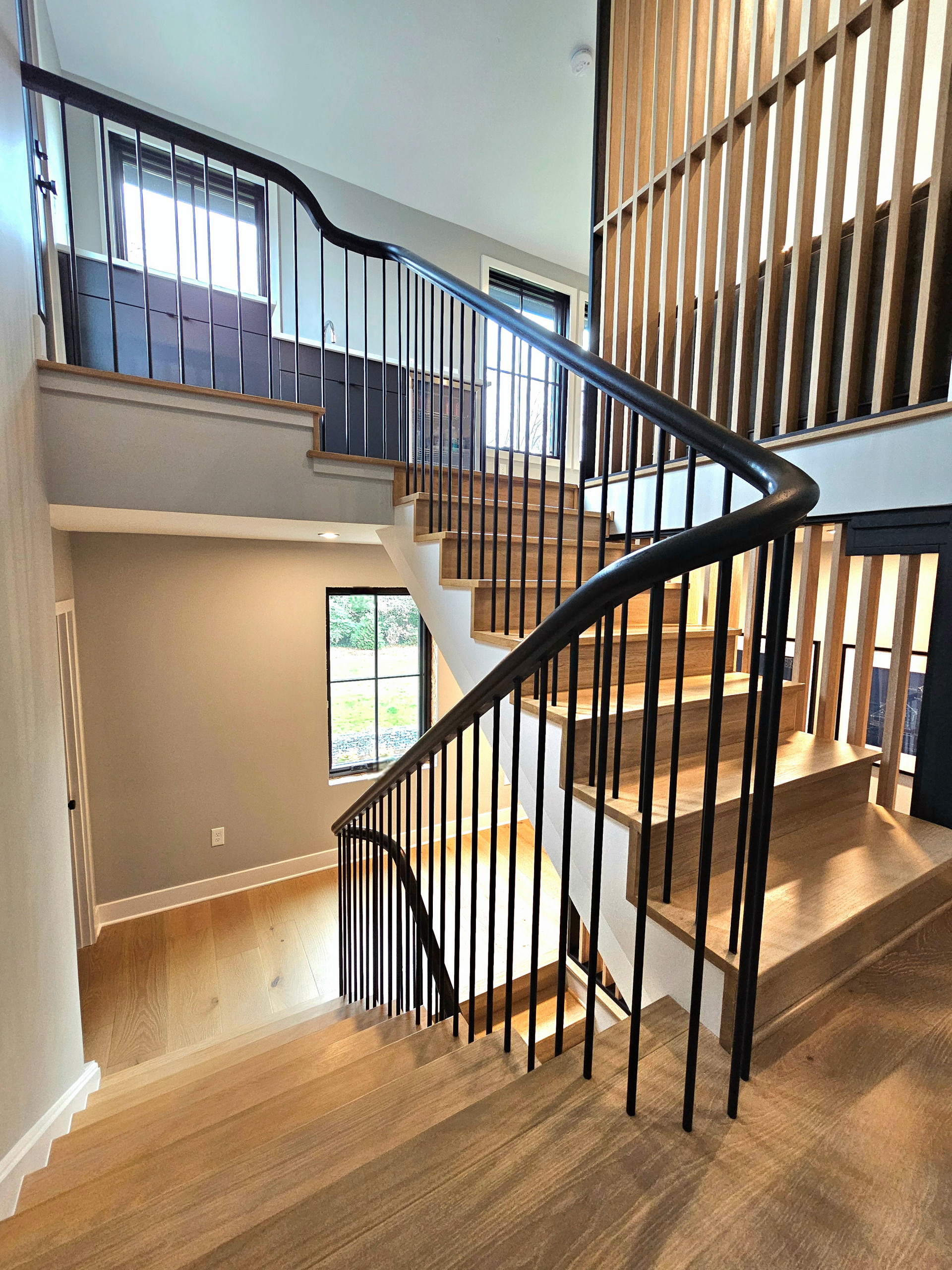 115_Stunning Continuous Rail System on 3 Story Floating Stairs; Arlington, VA 22