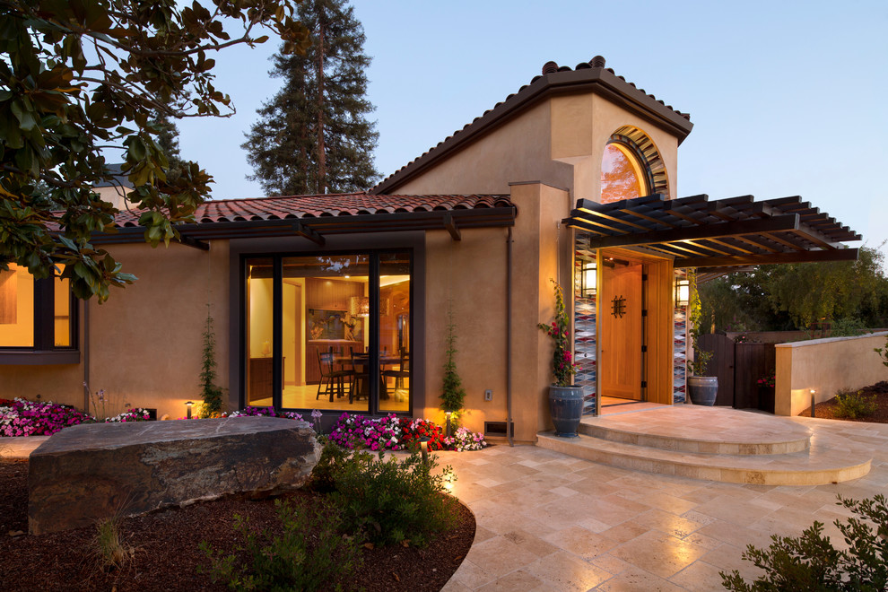 Design ideas for a large contemporary one-storey stucco beige exterior in San Francisco.