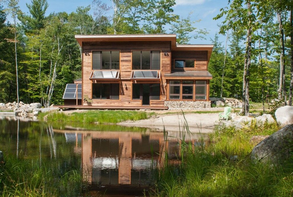 This is an example of a country two-storey exterior in New York with wood siding.