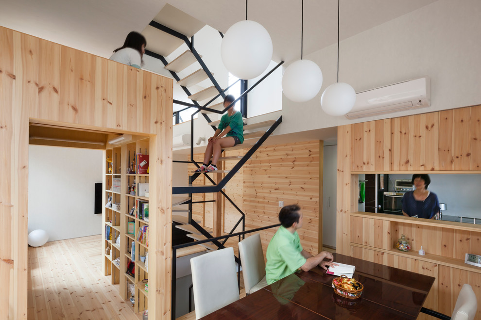 Design ideas for a contemporary wood l-shaped staircase in Tokyo Suburbs with open risers.