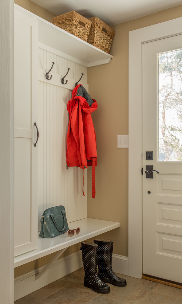 Inspiration for a transitional mudroom remodel in Boston