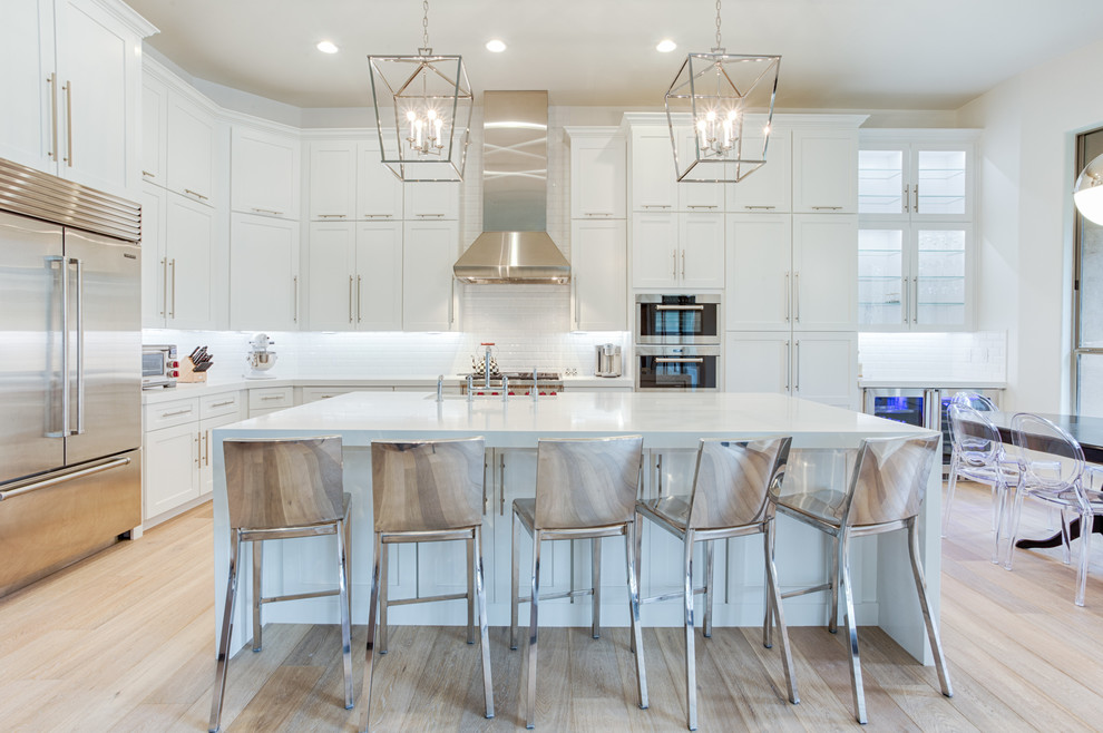 Inspiration for a large transitional galley open concept kitchen remodel in Phoenix with shaker cabinets and an island