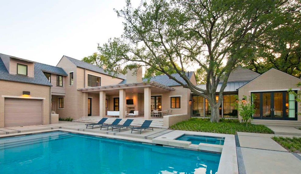 Contemporary rectangular pool in Dallas with concrete pavers.