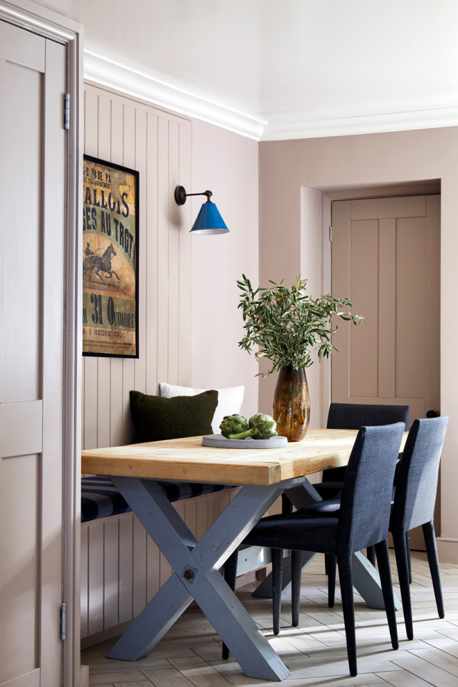 Inspiration for a medium sized traditional dining room in London with ceramic flooring and blue floors.