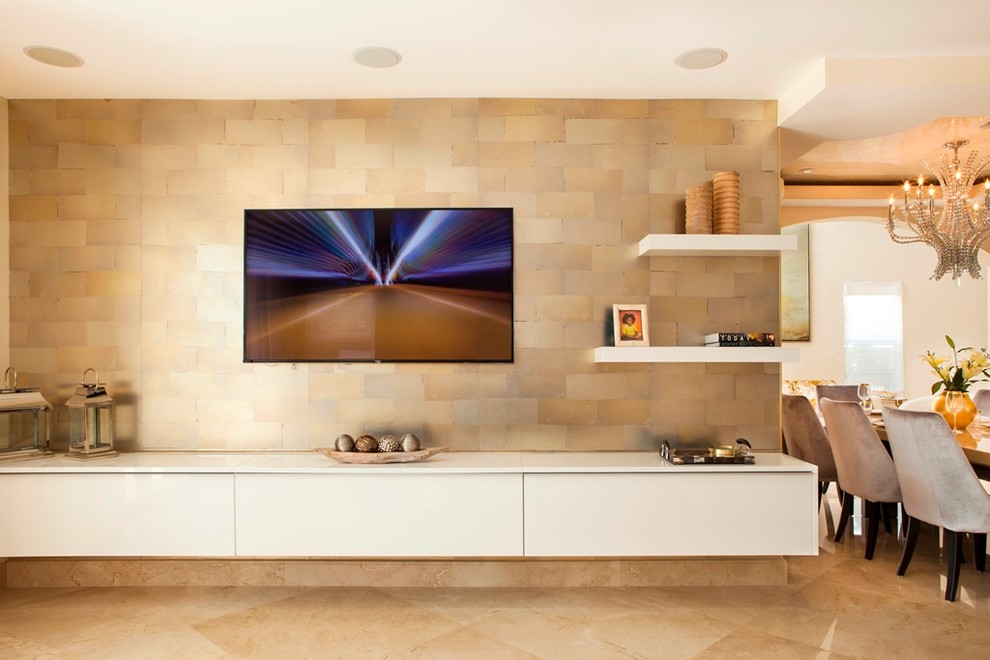 This is an example of a large modern formal open concept living room in Miami with beige walls, ceramic floors and a wall-mounted tv.