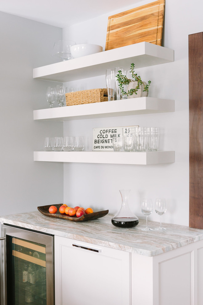 Inspiration for a transitional u-shaped dark wood floor and brown floor eat-in kitchen remodel in Chicago with an undermount sink, shaker cabinets, dark wood cabinets, marble countertops, beige backsplash, stainless steel appliances, an island and beige countertops