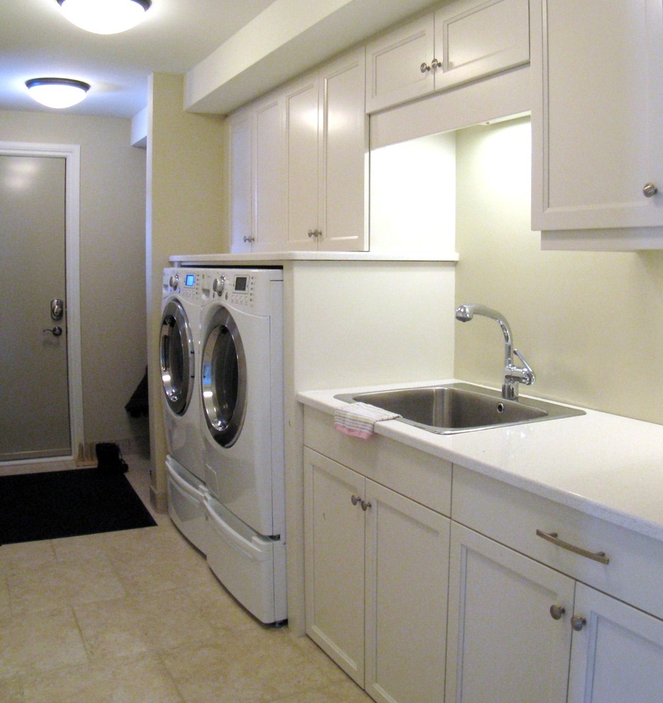 Design ideas for a transitional laundry room in Ottawa.