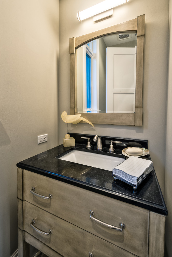 Example of a transitional home design design in Miami