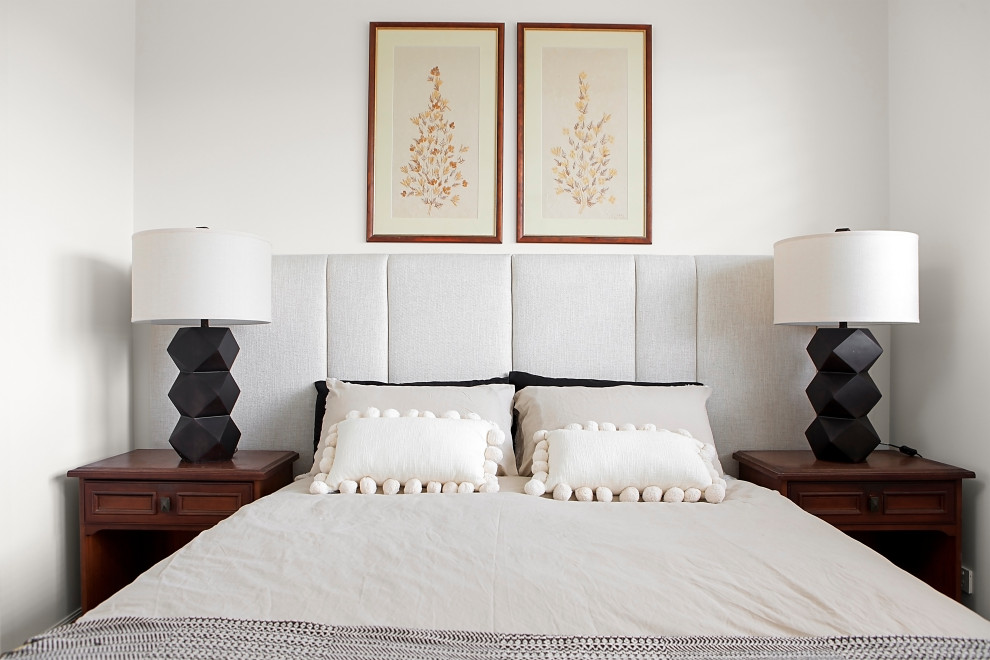 Photo of a mid-sized contemporary guest bedroom in Sydney with white walls, carpet, beige floor and panelled walls.