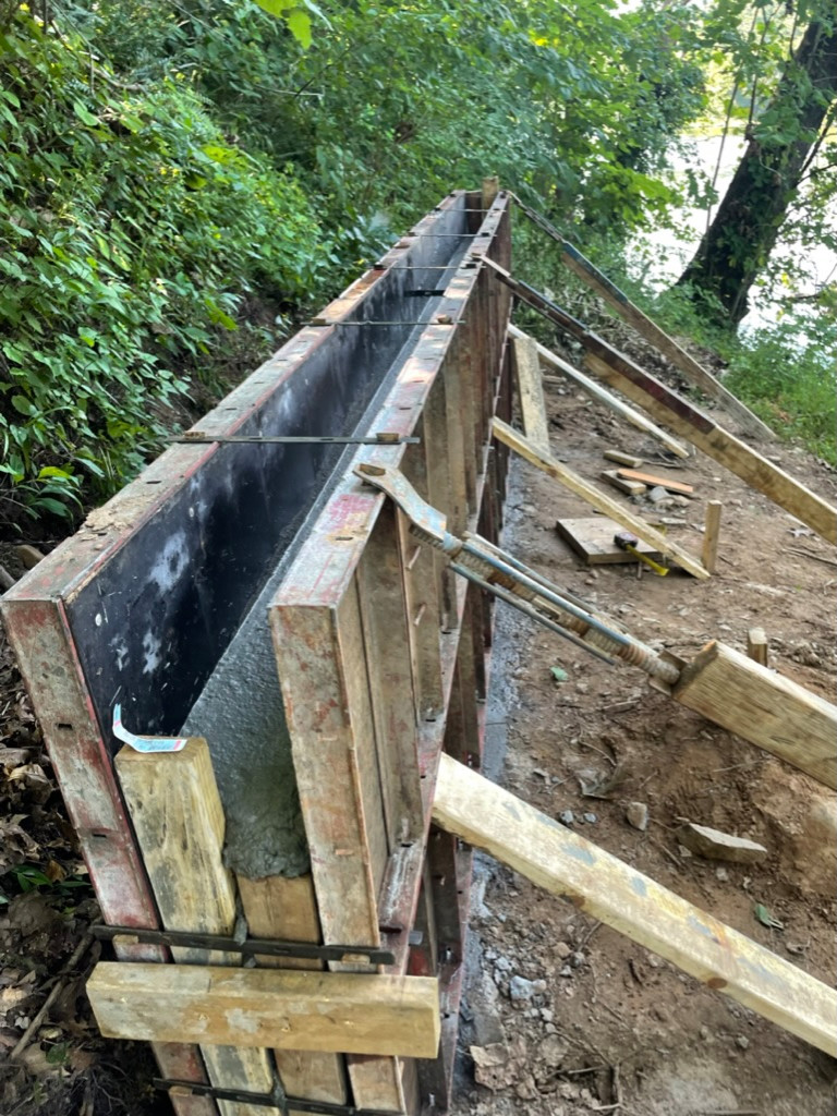 Elizabeths concrete stamp and steps to axess the river