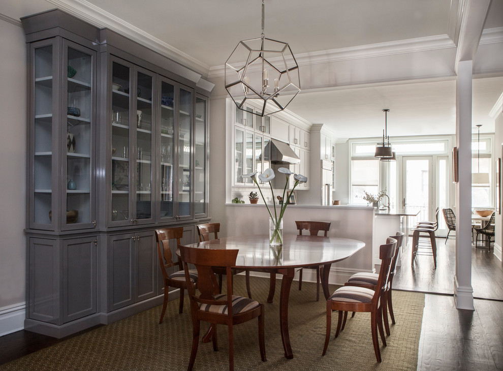 Design ideas for a transitional dining room in New York with grey walls and dark hardwood floors.