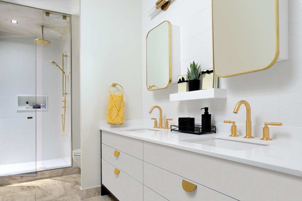 Inspiration for a small contemporary ensuite bathroom in Toronto with flat-panel cabinets, white cabinets, an alcove bath, a shower/bath combination, a one-piece toilet, white tiles, porcelain tiles, white walls, porcelain flooring, a submerged sink, engineered stone worktops, black floors, a shower curtain, white worktops, double sinks and a built in vanity unit.