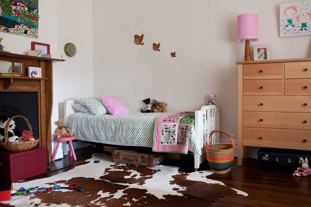 Traditional kids' bedroom in Adelaide with white walls and dark hardwood floors for girls.