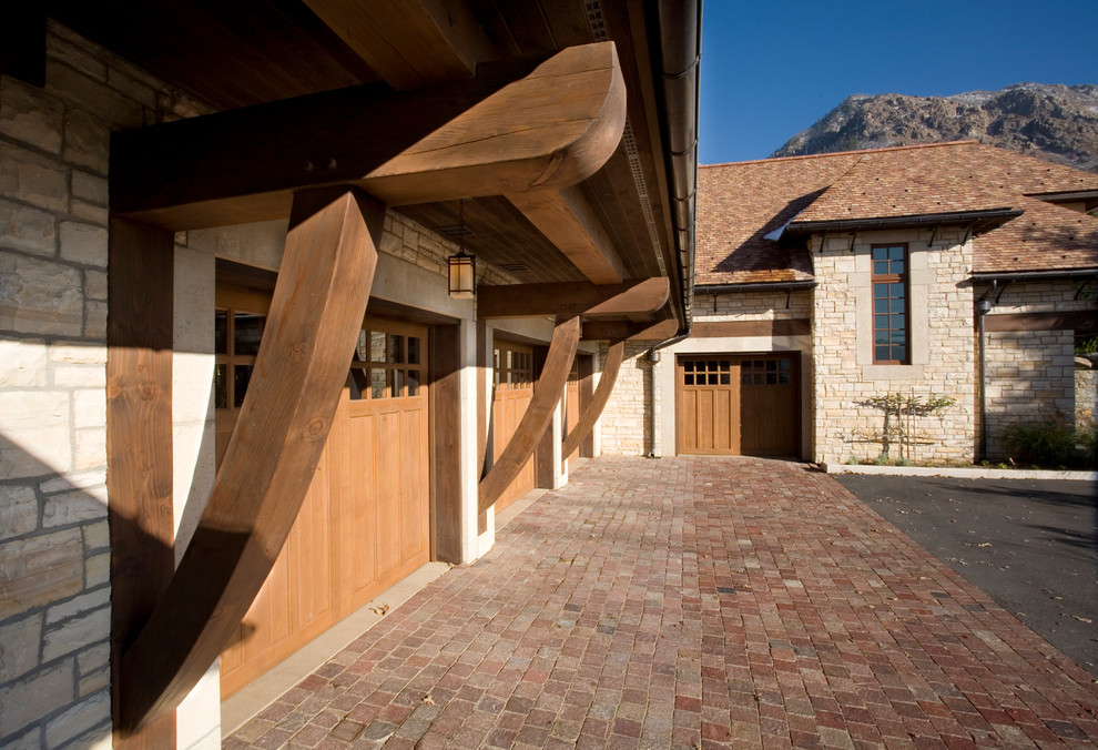Elegant three-car garage photo in Salt Lake City