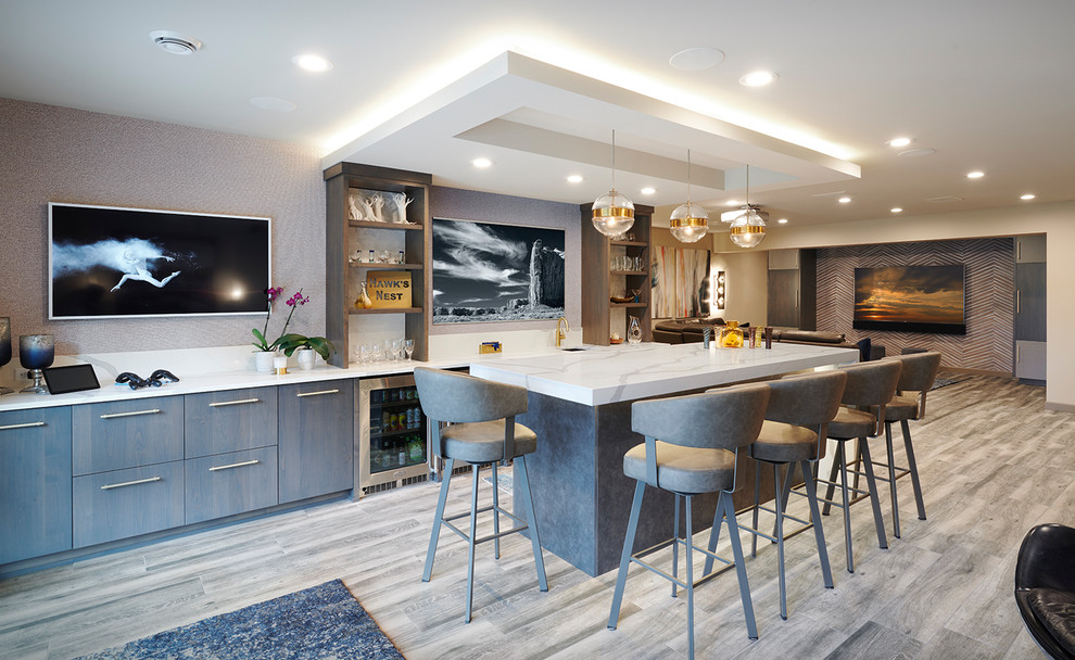 Contemporary seated home bar in Minneapolis with open cabinets, brown floor and white benchtop.