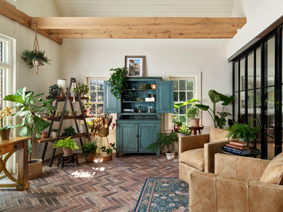 Mid-sized farmhouse brick floor and brown floor sunroom photo in Philadelphia