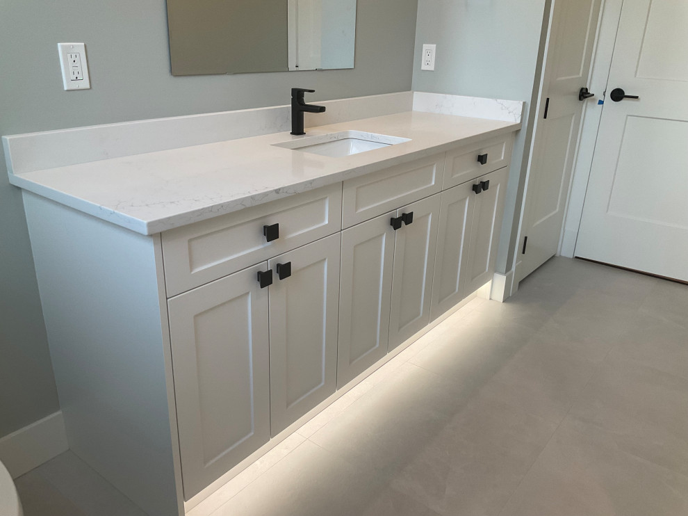 Bathroom renovation with new white sink vanity cabinet