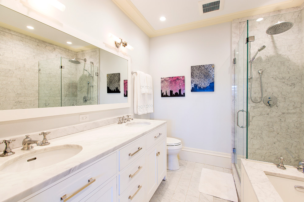 Design ideas for a large traditional master bathroom in Boston with white cabinets, a corner shower, white tile, ceramic tile, granite benchtops and an undermount sink.