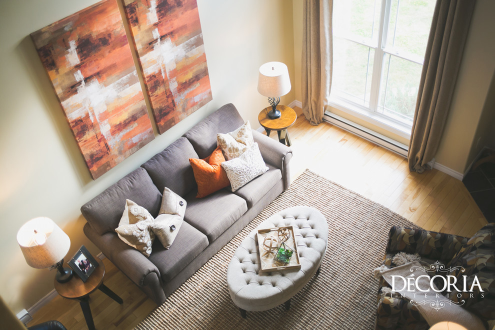 Inspiration for a small transitional formal and open concept light wood floor and beige floor home design remodel with beige walls, a standard fireplace and a tv stand