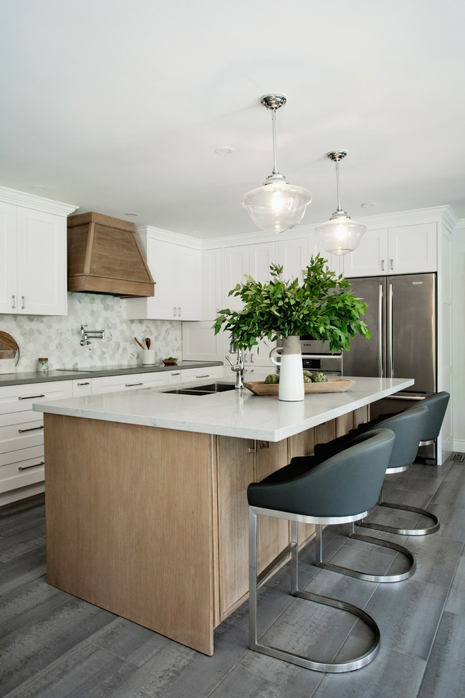 Example of a transitional kitchen design in Toronto
