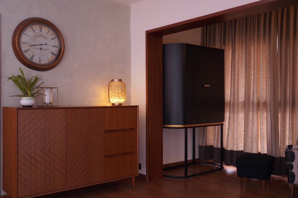 This is an example of a contemporary home bar in Bengaluru.
