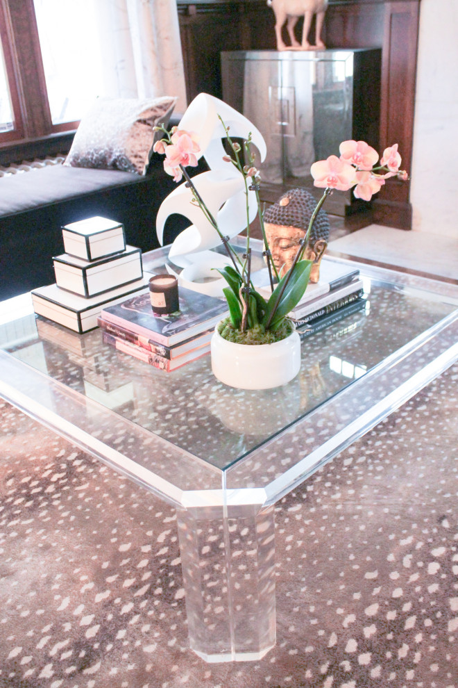 Inspiration for a large eclectic formal and enclosed medium tone wood floor living room remodel with pink walls, a standard fireplace and a stone fireplace
