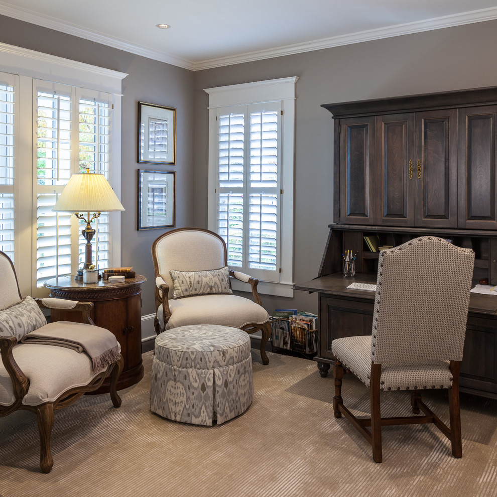 Example of a transitional home office design in Baltimore