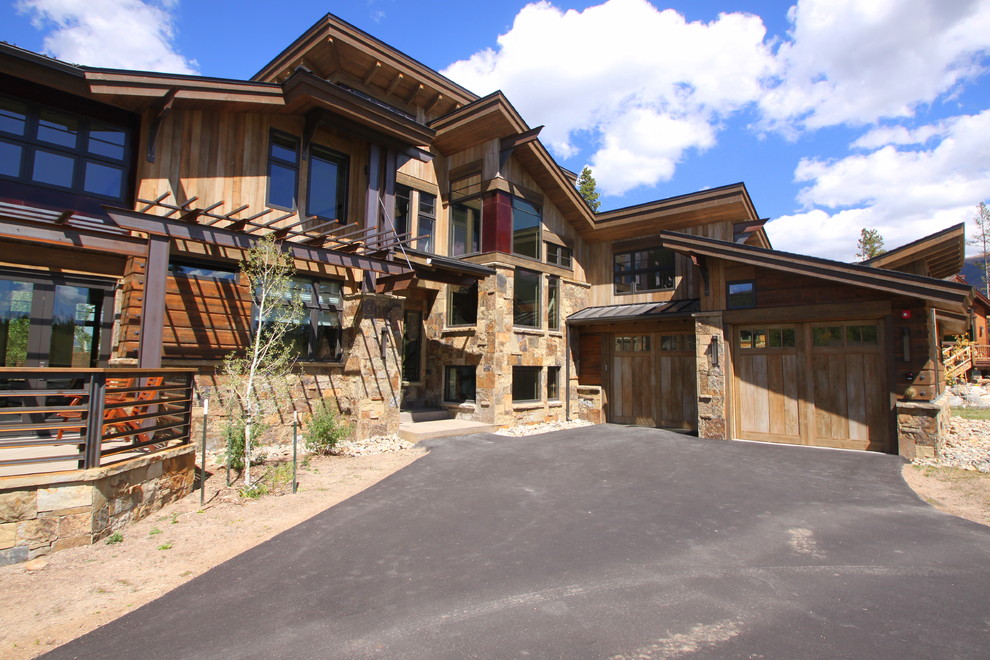 Country exterior in Denver with wood siding.