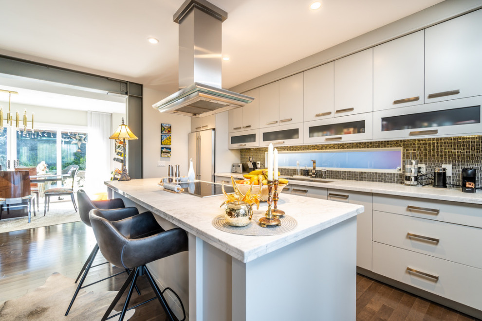 Example of a transitional kitchen design in Calgary